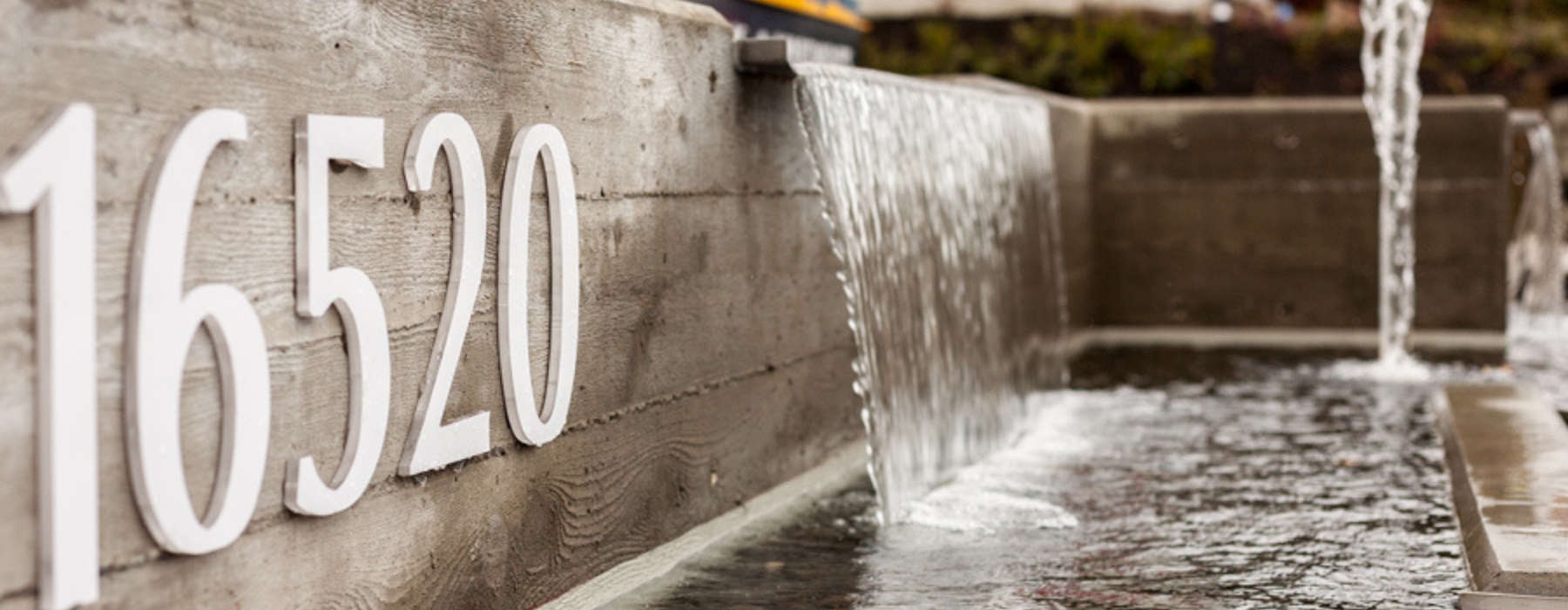 water feature with Altia address signage